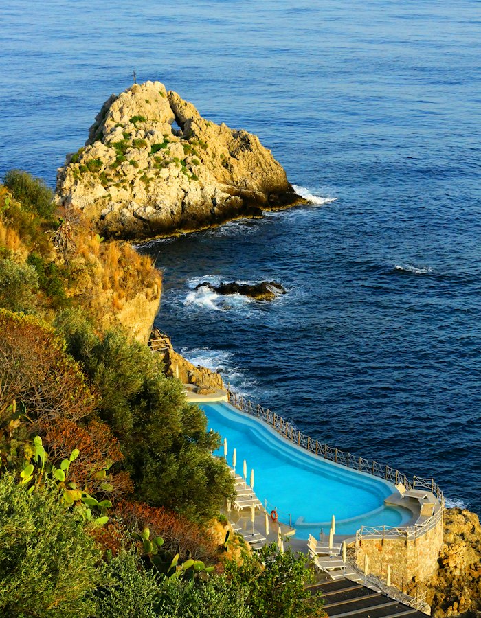 A cliffside pool overlooking the Mediterranean — the kind of coastal detail Mallorca is known for